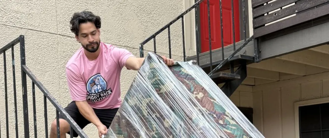 a piggyback mover on the stairs